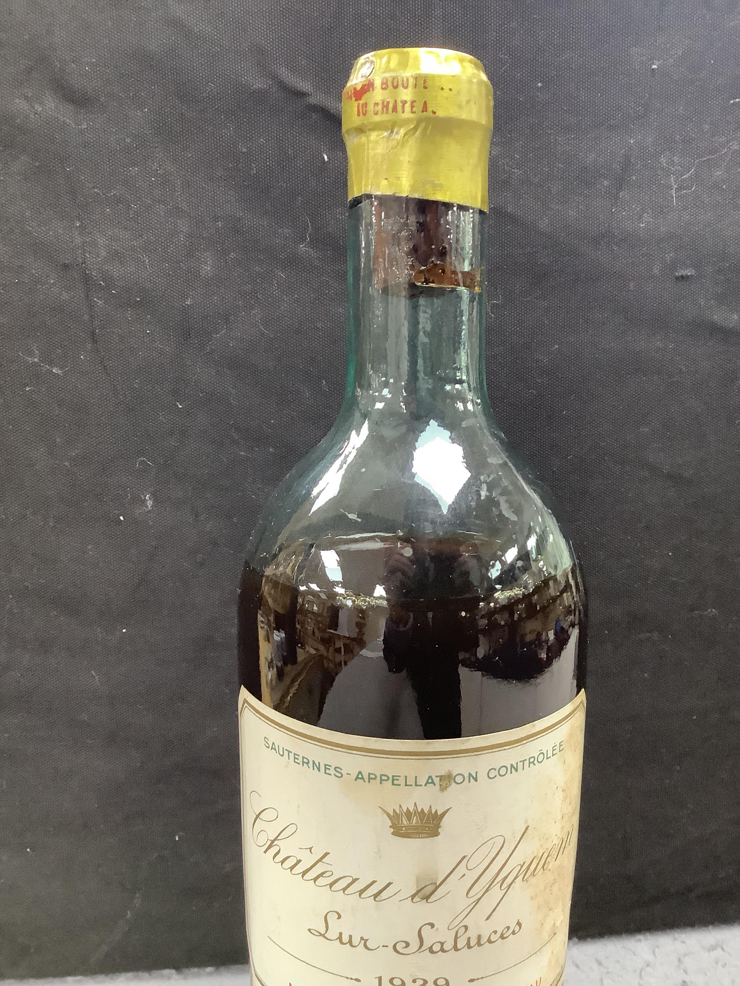 One bottle of Chateau d'Yquem 1939 and one half bottle of G.H. Mumm & Co 1928 Champagne